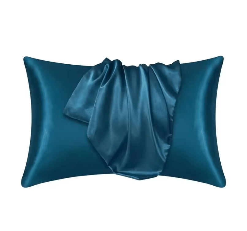 Peacock Blue Silk pillow on a white background
